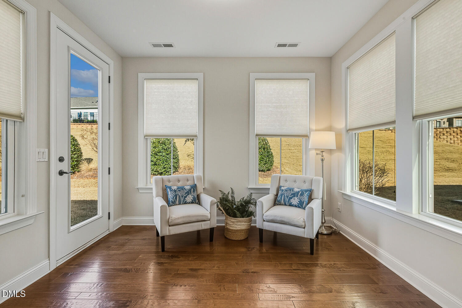 1025 Nickelby Street Durham, NC 27703 - Photo 26 of 71 a living room with couches and a table with wooden floor
