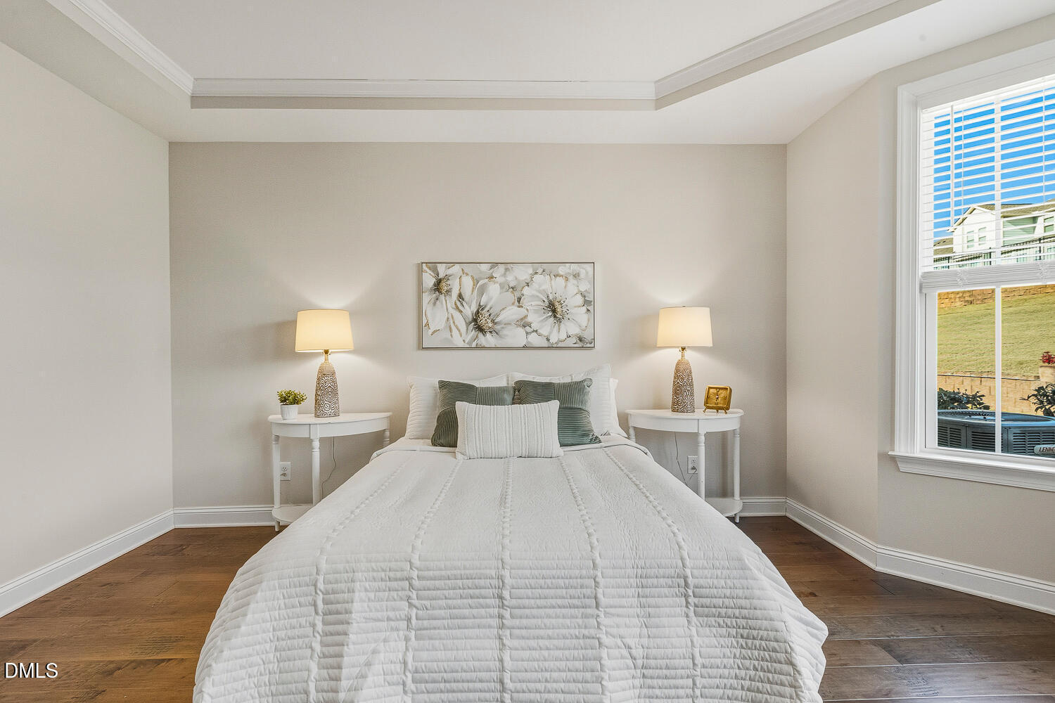 1025 Nickelby Street Durham, NC 27703 - Photo 30 of 71 a bedroom with a bed and a night stand