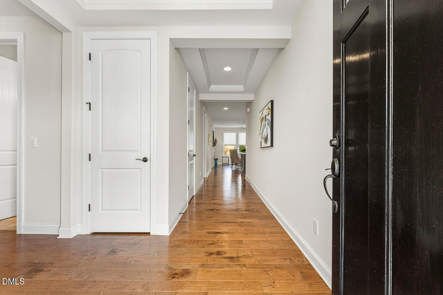 1025 Nickelby Street Durham, NC 27703 - Photo 4 of 71 a view of a hallway with the wooden floor and staircase