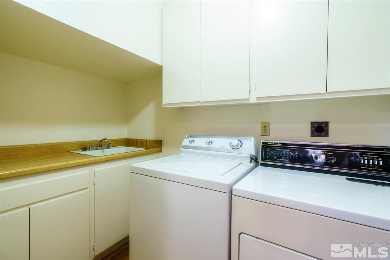 465 Anne Marie Court Reno, NV 89509 - Photo 18 of 21 a utility room with dryer and washer