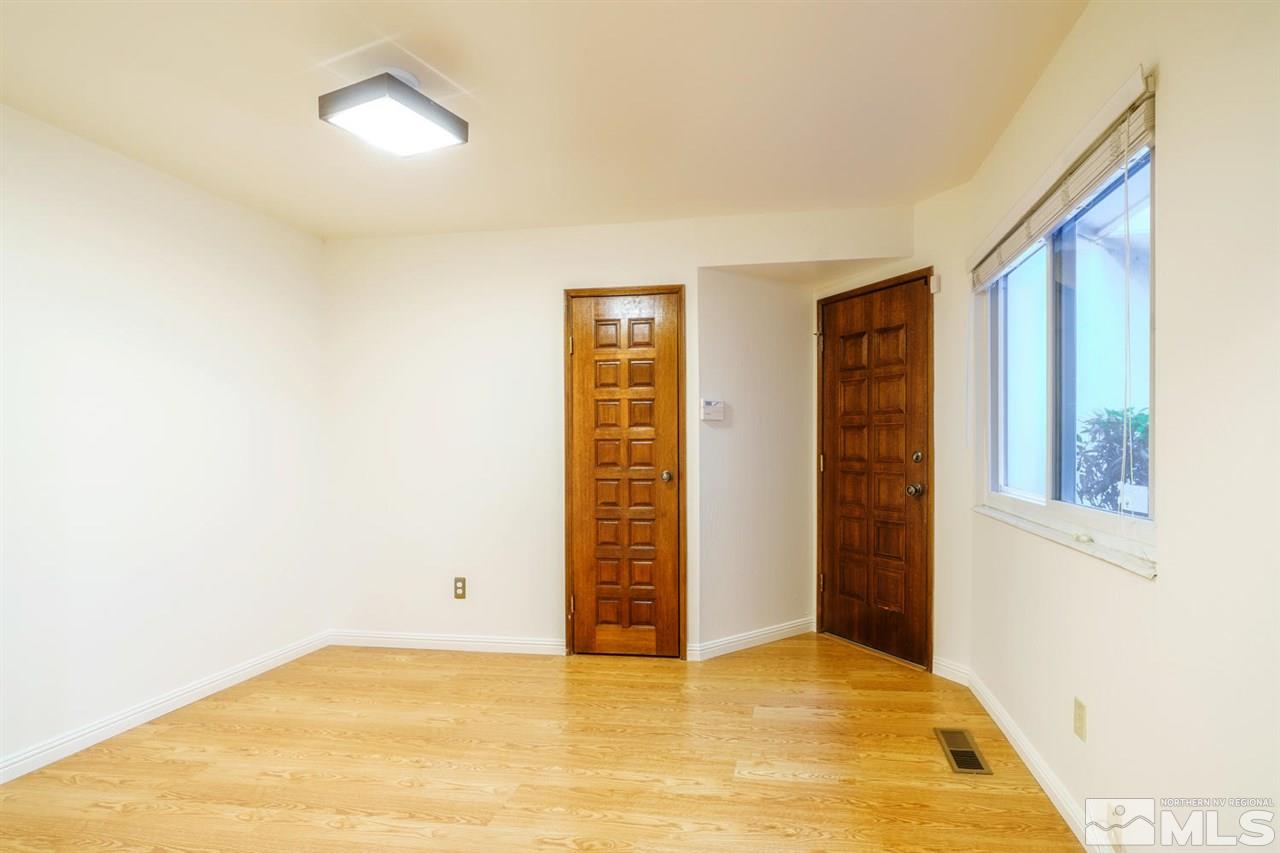 465 Anne Marie Court Reno, NV 89509 - Photo 10 of 21 a view of an empty room with window and stairs