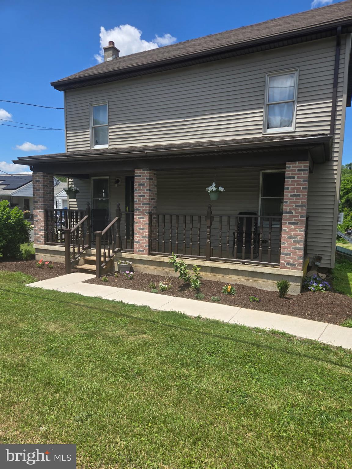 a view of swimming pool with outdoor seating