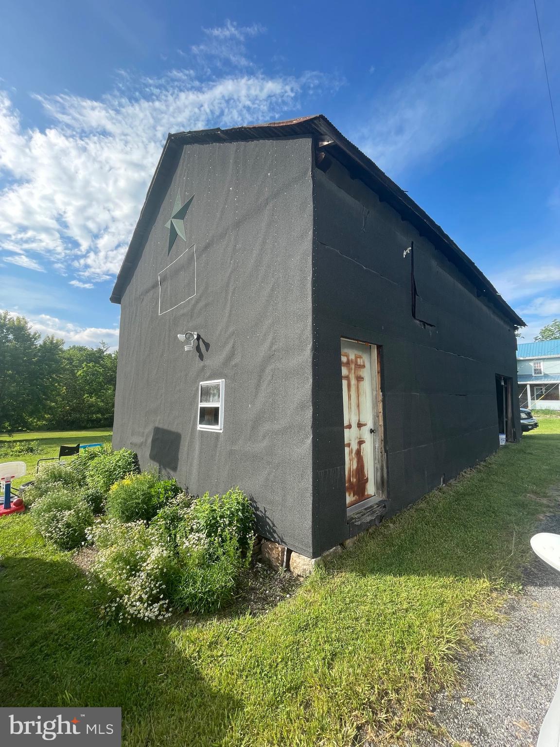 5035 Back Maitland Road McClure, PA 17841 - Photo 17 of 28 a front view of a house with a yard