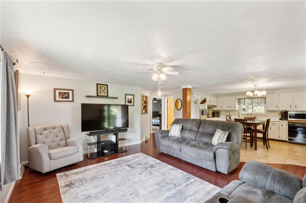 1213 Lower Mateer Road Vandergrift, PA 15690 - Photo 6 of 28 a living room with furniture and a flat screen tv