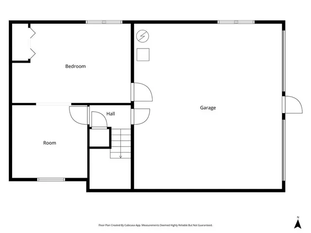 a picture of a room with a white wall and a picture of a painting on the wall