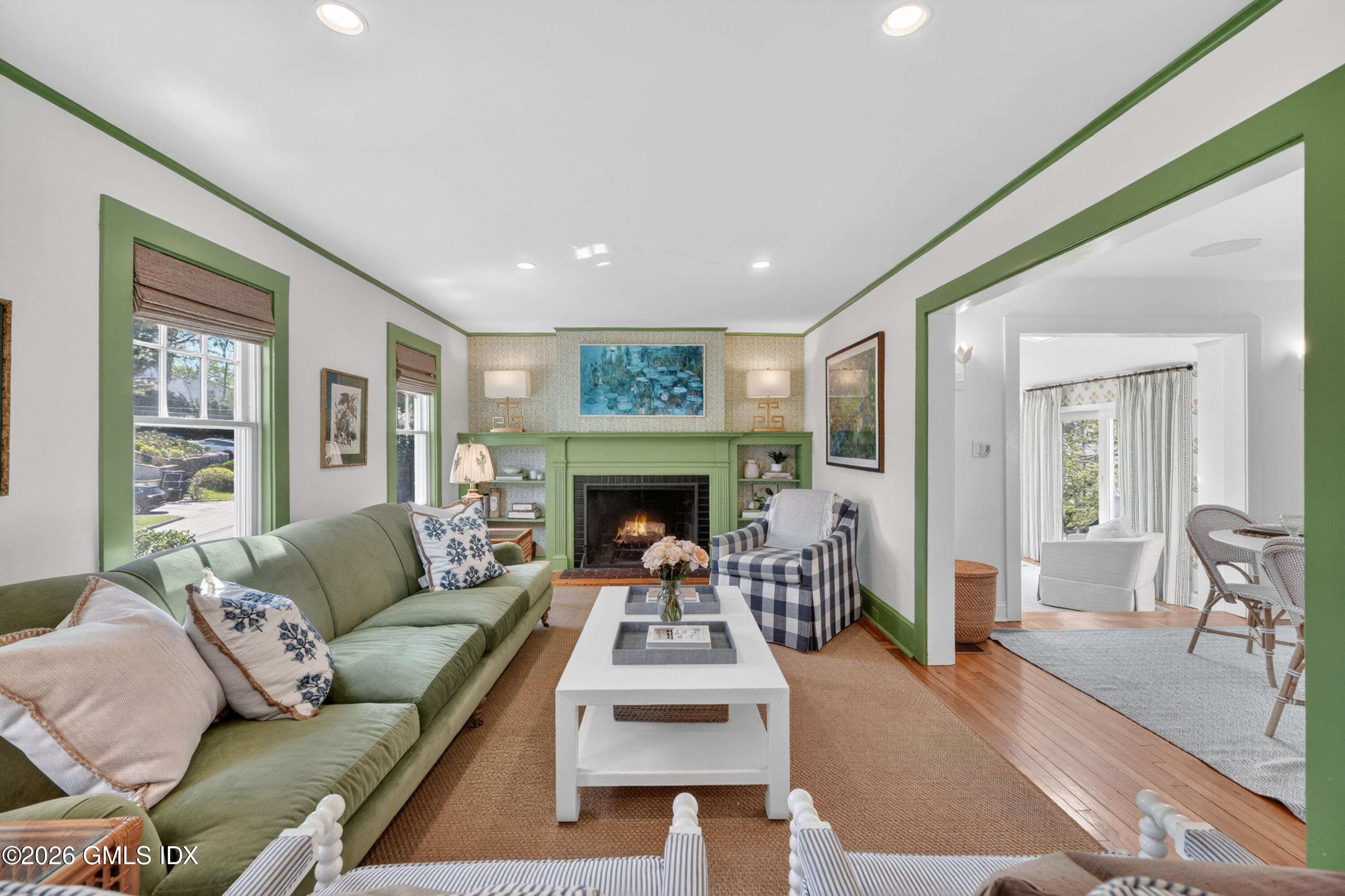 20 Ridge Road Cos Cob, CT 06807 - Photo 6 of 36 a living room with furniture and a fireplace