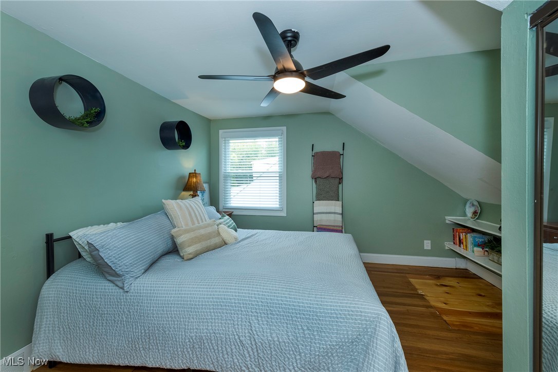 33716 Baldwin Road Solon, OH 44139 - Photo 23 of 40 Bedroom with hardwood / wood-style flooring, ceiling fan, and lofted ceiling