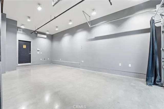 a view of an entryway with front door