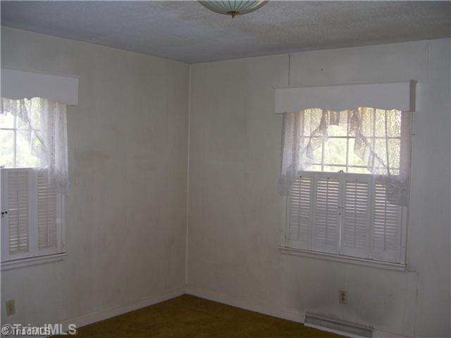 392 Inwood Road Asheboro, NC 27205 - Photo 9 of 16 Master Bedroom. Master bedroom