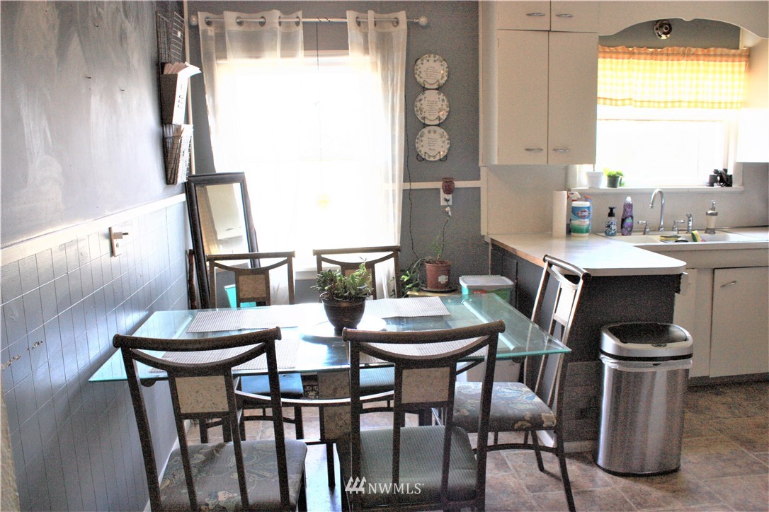 171 Poetsch Road Toledo, WA 98591 - Photo 8 of 23 a view of a dining room with furniture and window