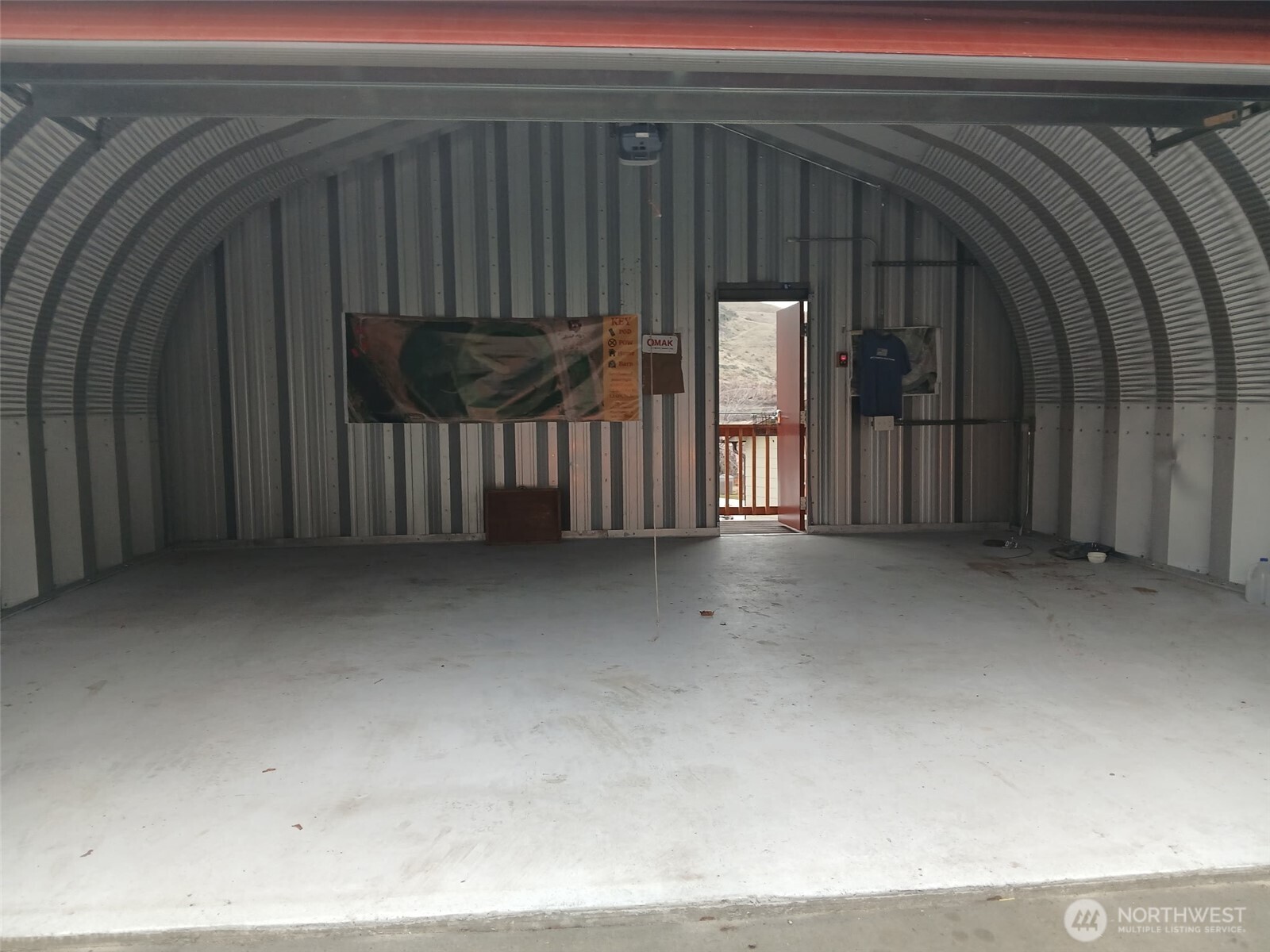 505 Beach Street Pateros, WA 98846 - Photo 35 of 36 a view of a house with a wooden fence