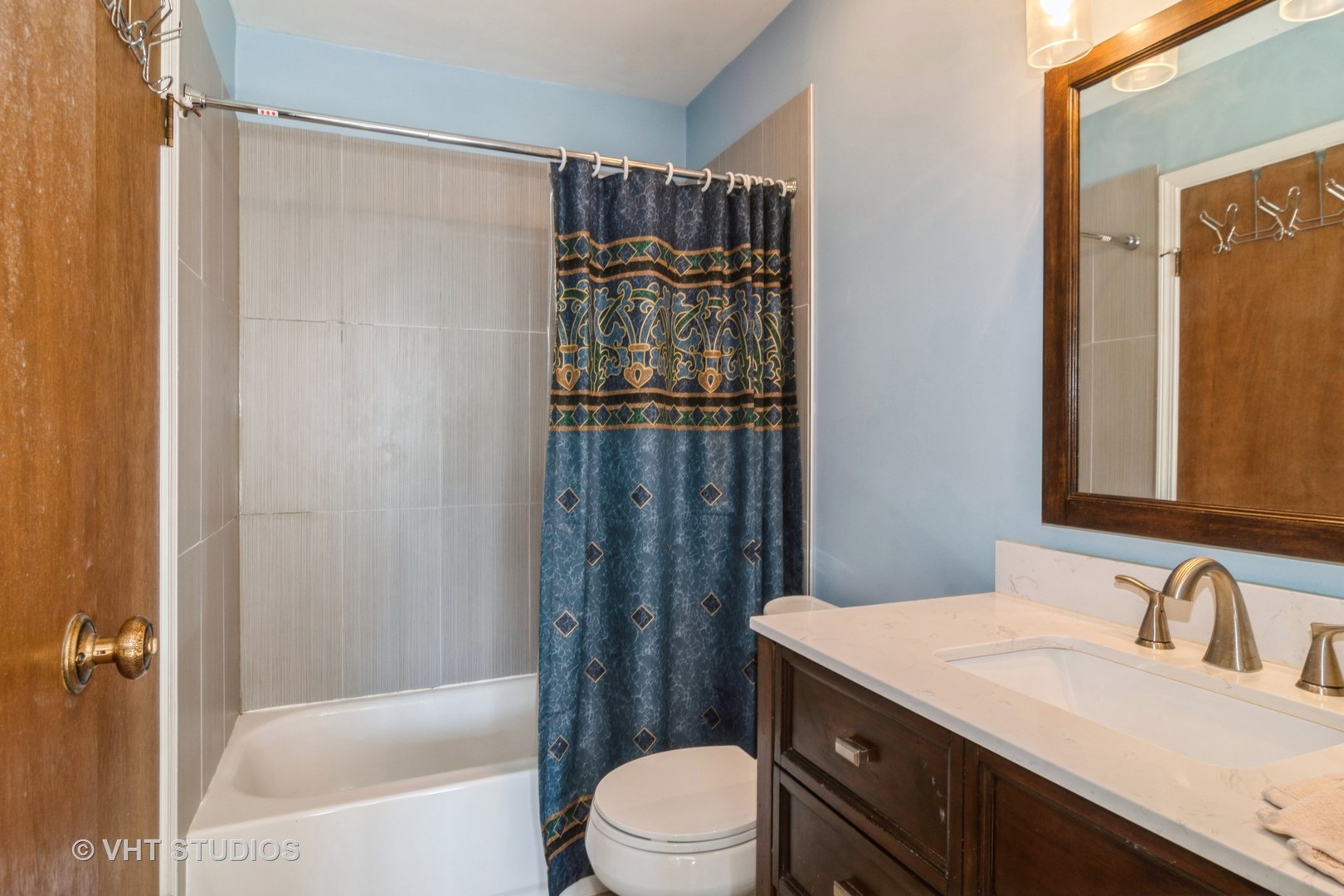 4S768 Pinehurst Drive Naperville, IL 60563 - Photo 13 of 21 a bathroom with a sink a toilet and shower