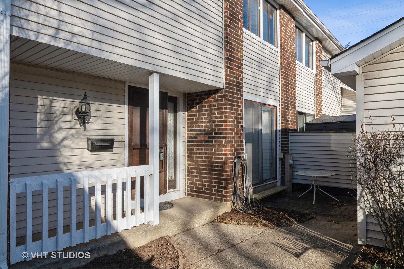 4S768 Pinehurst Drive Naperville, IL 60563 - Photo 3 of 21 a view of a house with a yard and wooden floor and fence
