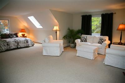32 Meadowbrook Road Mashpee, MA 02649 - Photo 11 of 16 a living room with furniture and a large window