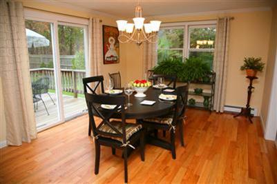 32 Meadowbrook Road Mashpee, MA 02649 - Photo 6 of 16 a view of a dining room with furniture window and wooden floor