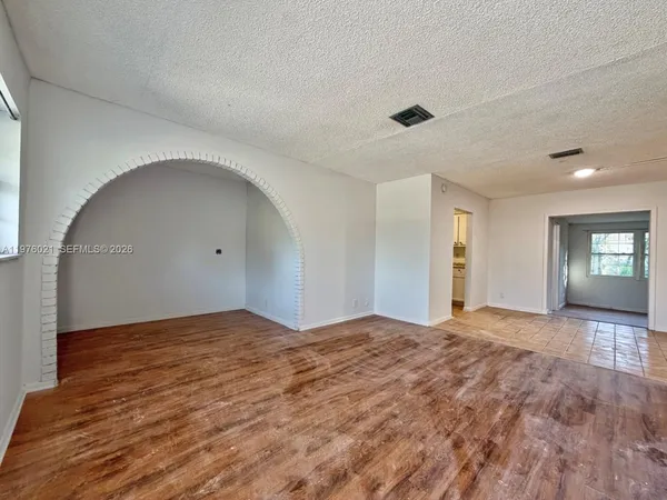 a view of an empty room and window