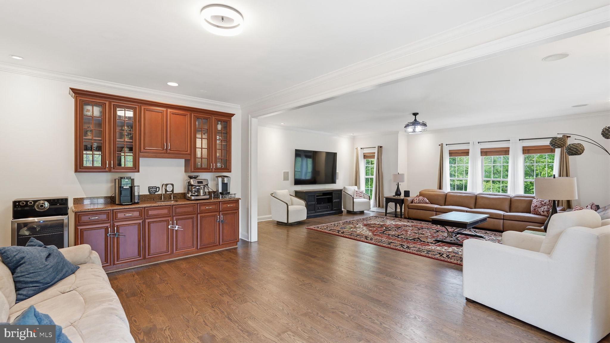 15613 Thoroughfare Road Gainesville, VA 20155 - Photo 23 of 63 a living room with furniture window and wooden floor