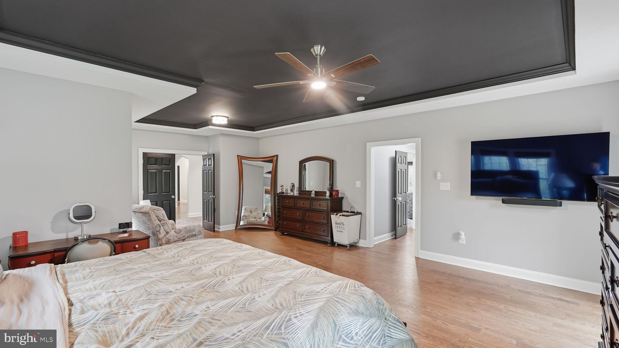 15613 Thoroughfare Road Gainesville, VA 20155 - Photo 26 of 63 Spacious bedroom with modern elegance.