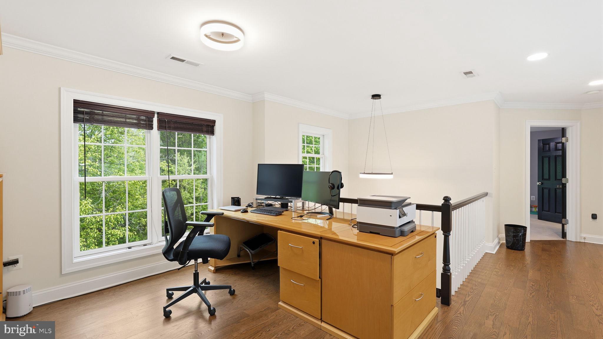15613 Thoroughfare Road Gainesville, VA 20155 - Photo 30 of 63 a view of a workspace with furniture and a window
