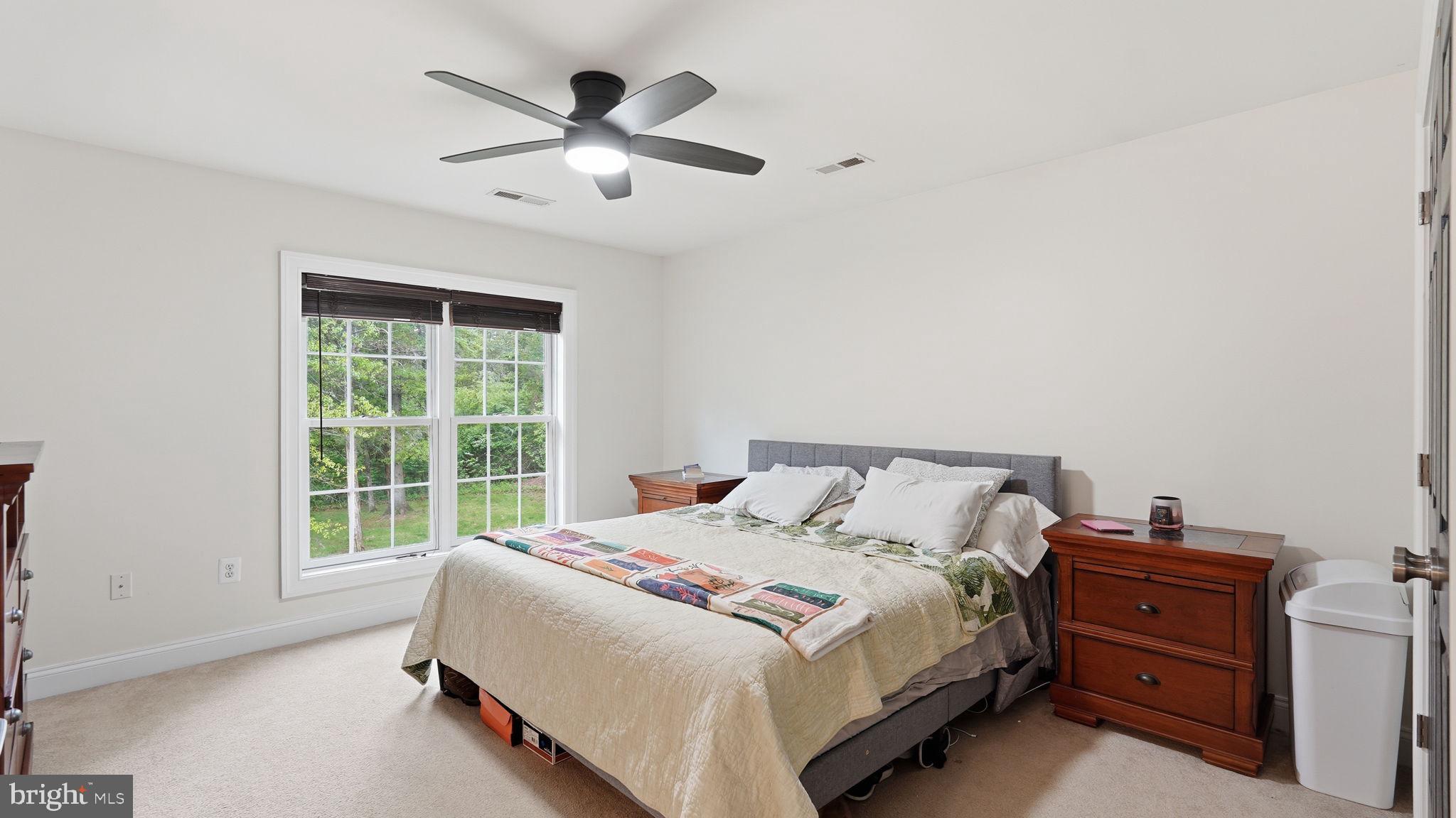 15613 Thoroughfare Road Gainesville, VA 20155 - Photo 31 of 63 a bedroom with a bed and a window