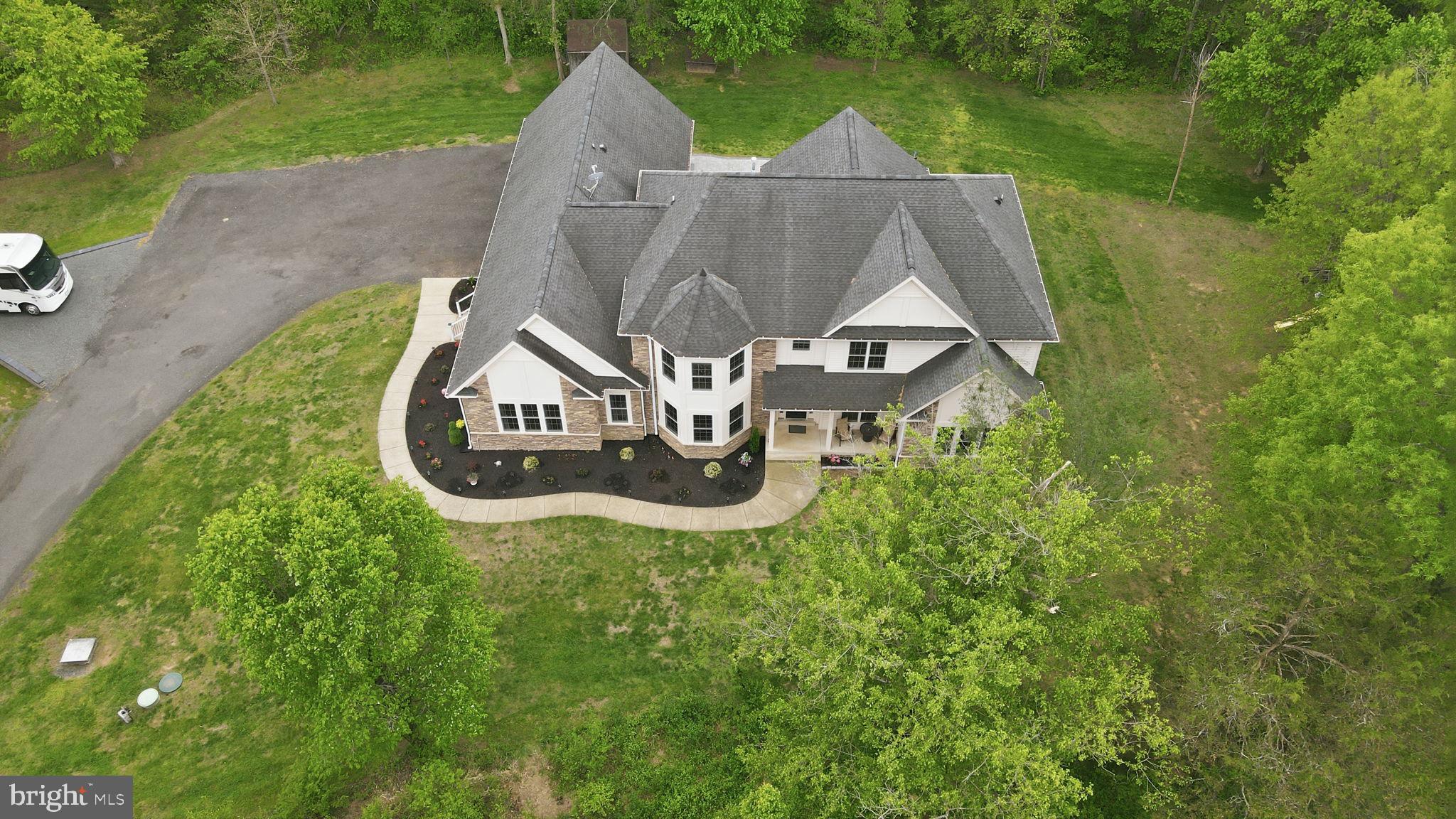 15613 Thoroughfare Road Gainesville, VA 20155 - Photo 4 of 63 Elegant home nestled in lush greenery.