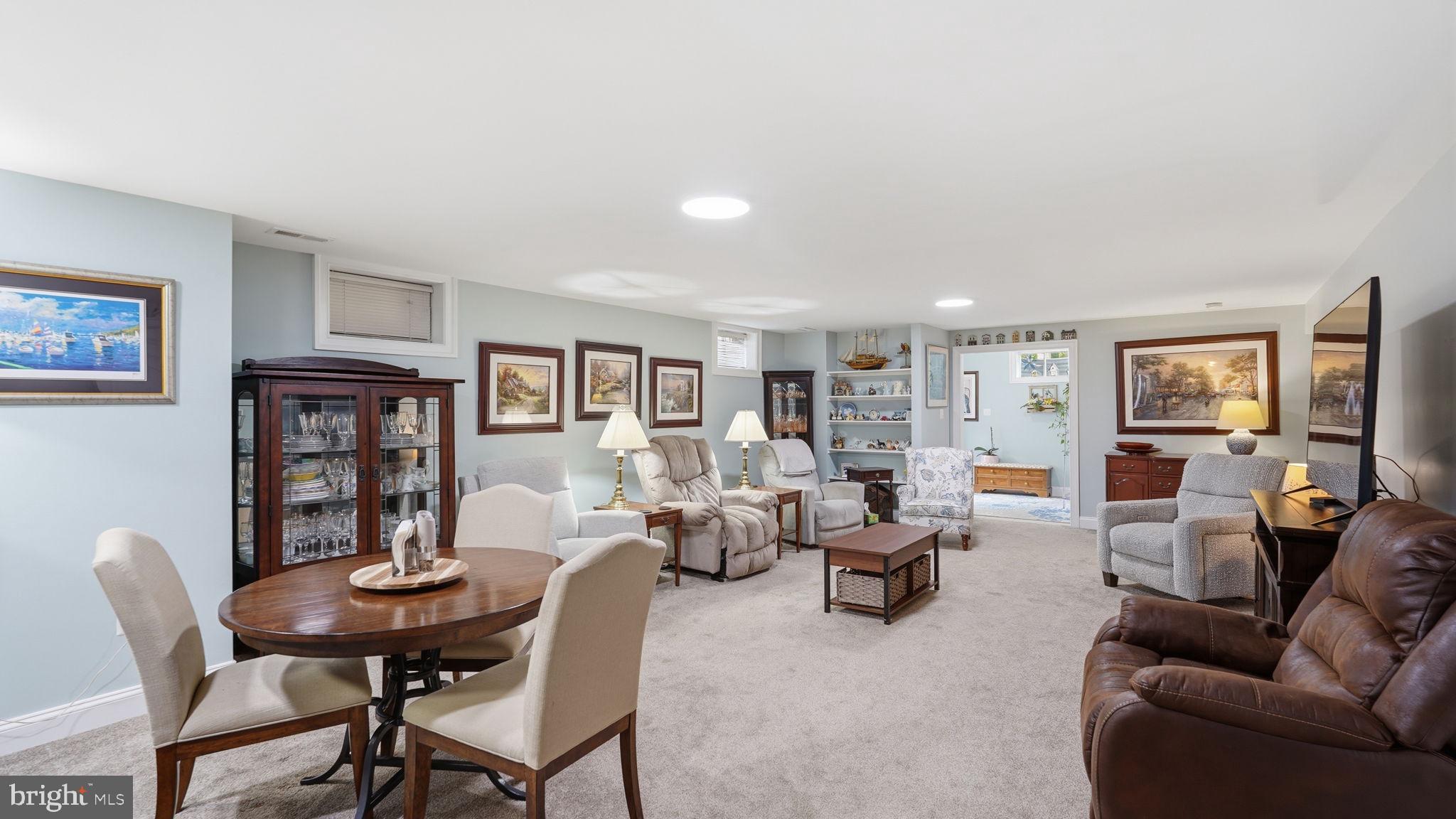 15613 Thoroughfare Road Gainesville, VA 20155 - Photo 45 of 63 a living room with furniture and wooden floor
