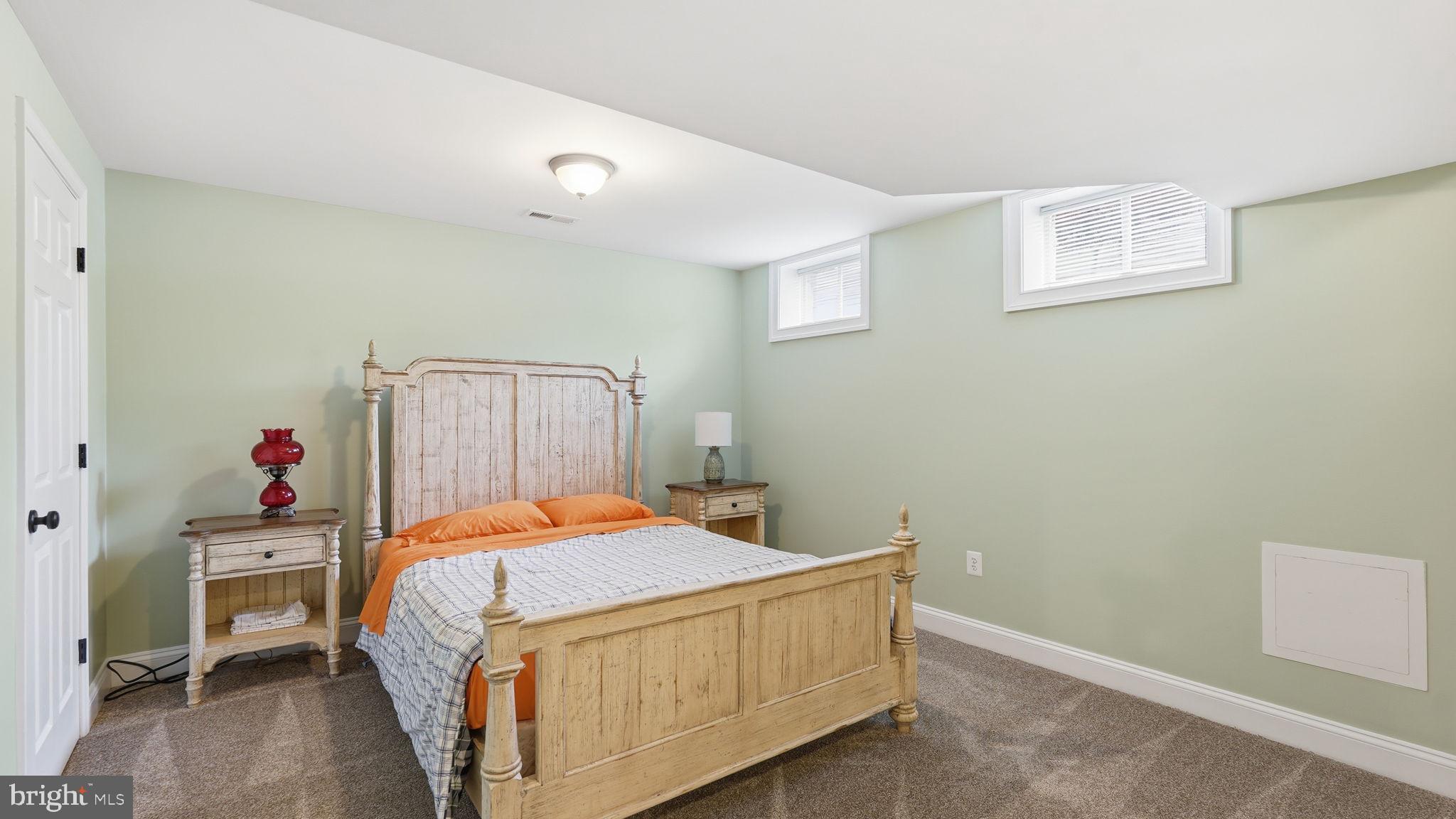 15613 Thoroughfare Road Gainesville, VA 20155 - Photo 48 of 63 a bedroom with a bed and a window