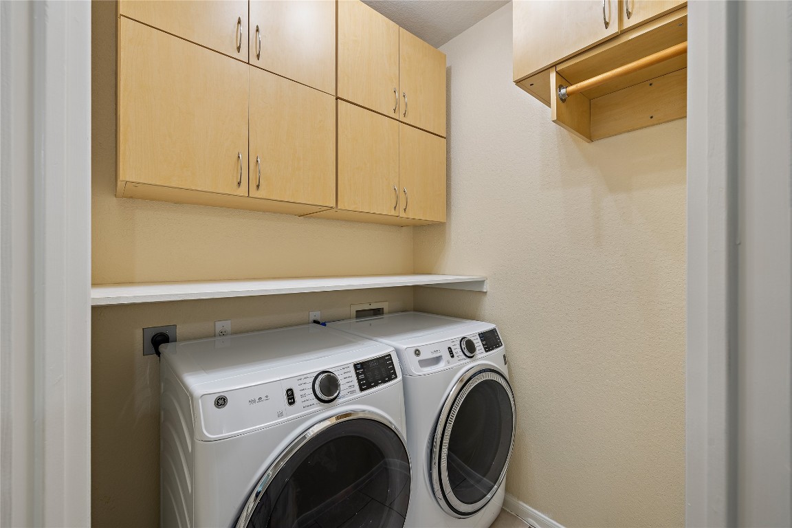 7002 Rambollet Terrace Round Rock, TX 78681 - Photo 17 of 37 a utility room with dryer and washer