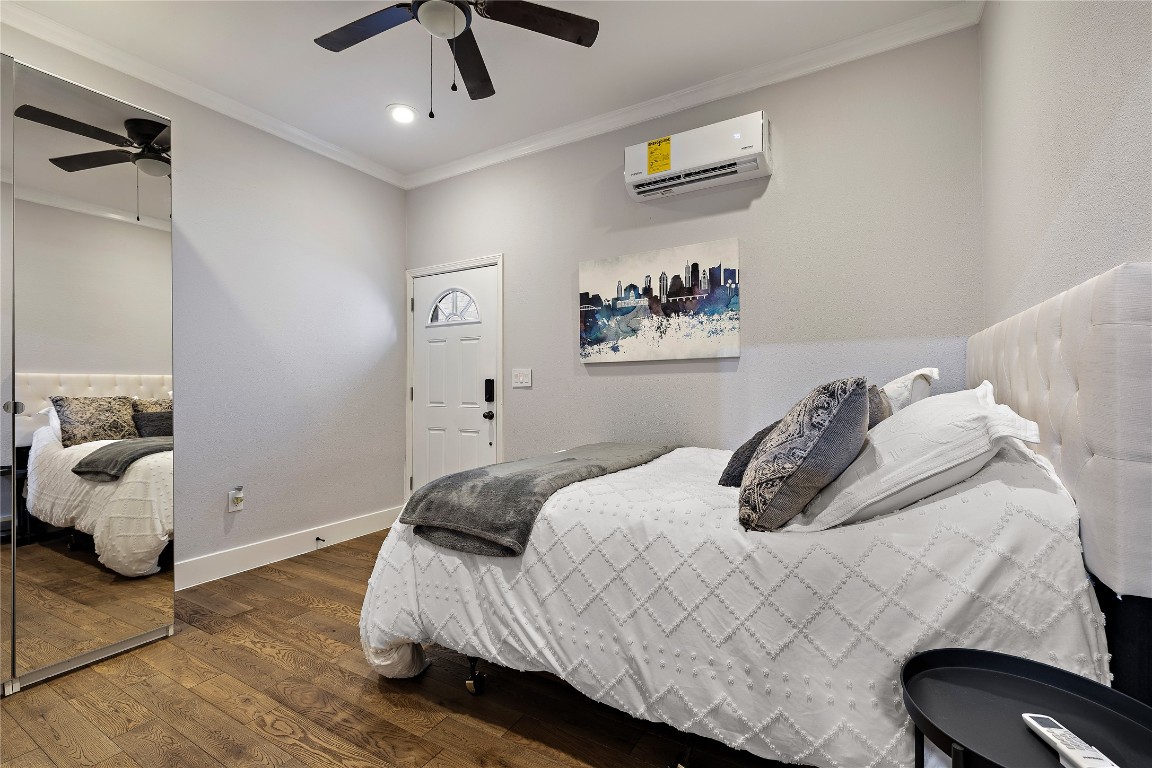 7002 Rambollet Terrace Round Rock, TX 78681 - Photo 22 of 37 a bedroom with a bed and a couch