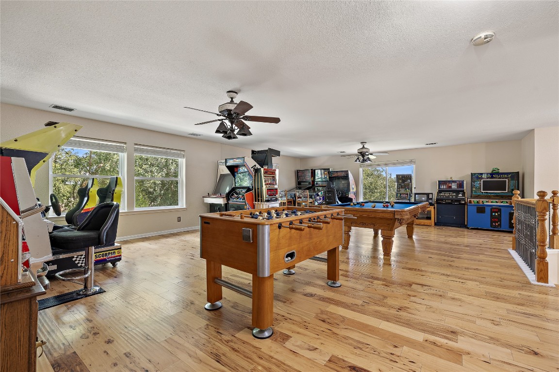7002 Rambollet Terrace Round Rock, TX 78681 - Photo 27 of 37 a view of a dining room with furniture window and wooden floor