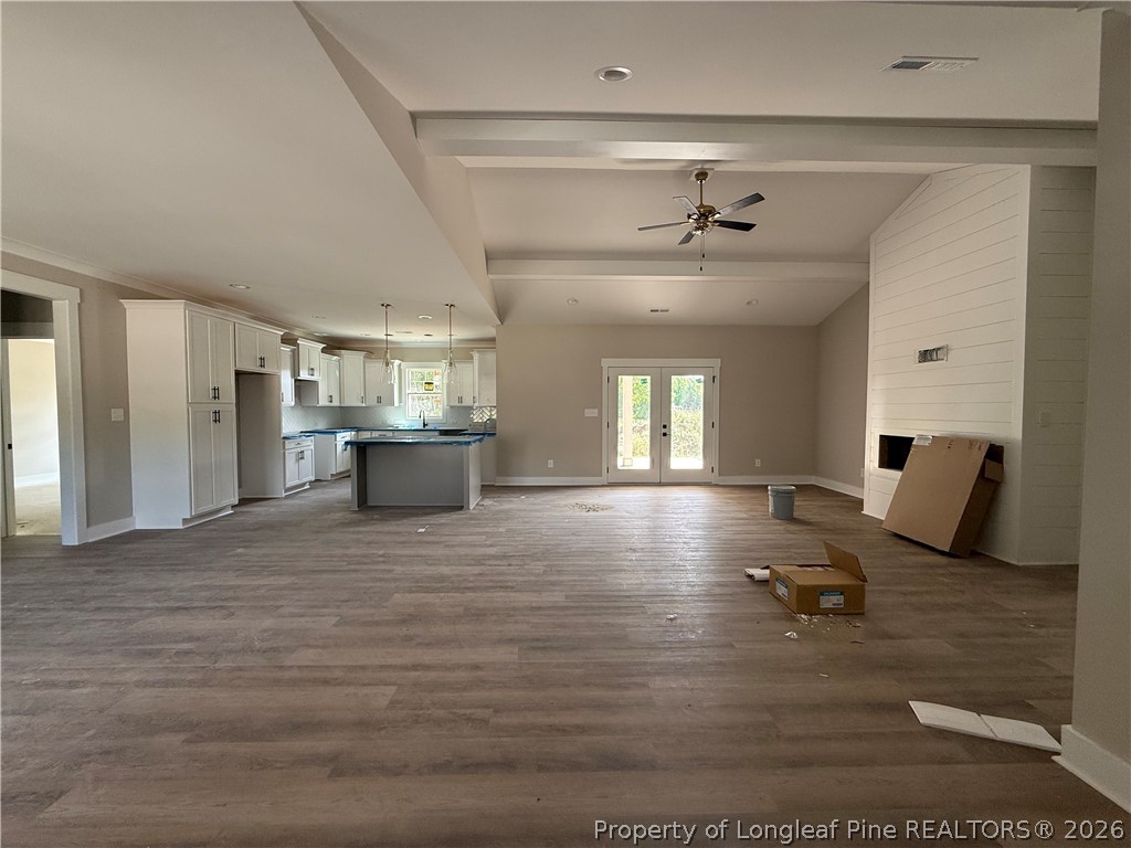 132 Ridge Stone Drive Autryville, NC 28318 - Photo 3 of 26 a view of kitchen and living room