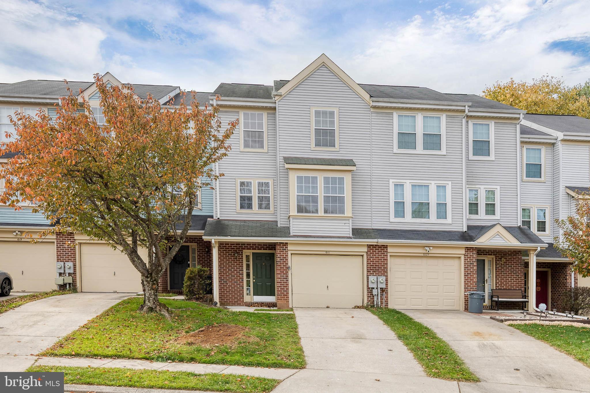 611 Brickston Road Reisterstown, MD 21136 - Photo 1 of 16 a front view of a house with a yard