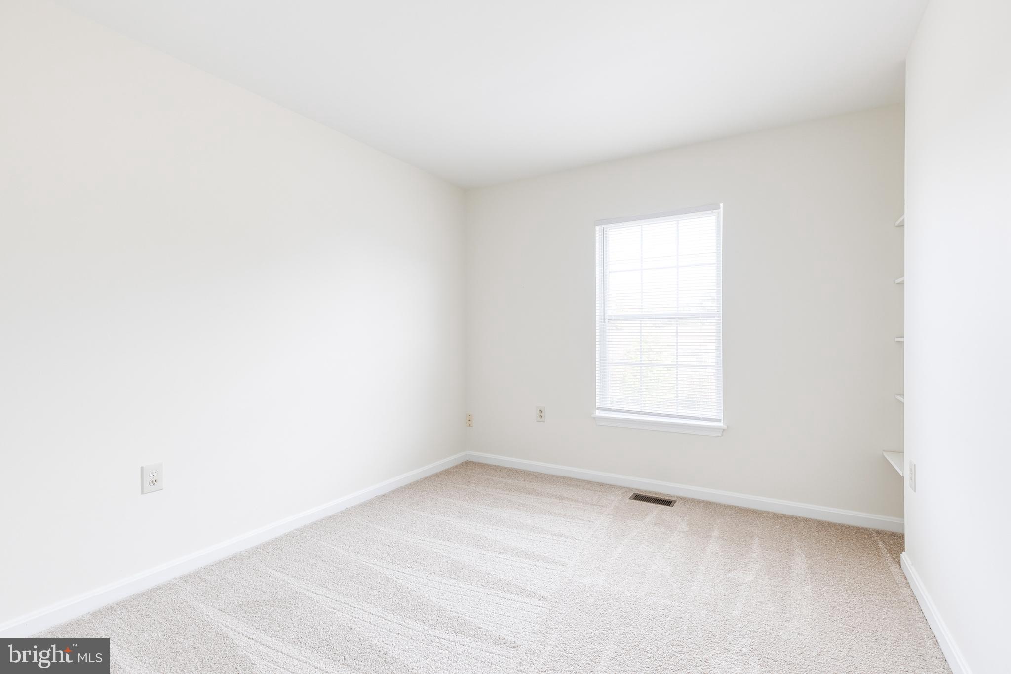 611 Brickston Road Reisterstown, MD 21136 - Photo 16 of 16 an empty room with a window
