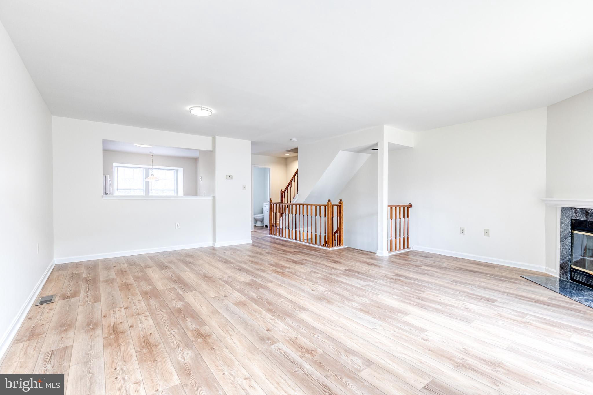 611 Brickston Road Reisterstown, MD 21136 - Photo 5 of 16 a view of a livingroom with a staircase