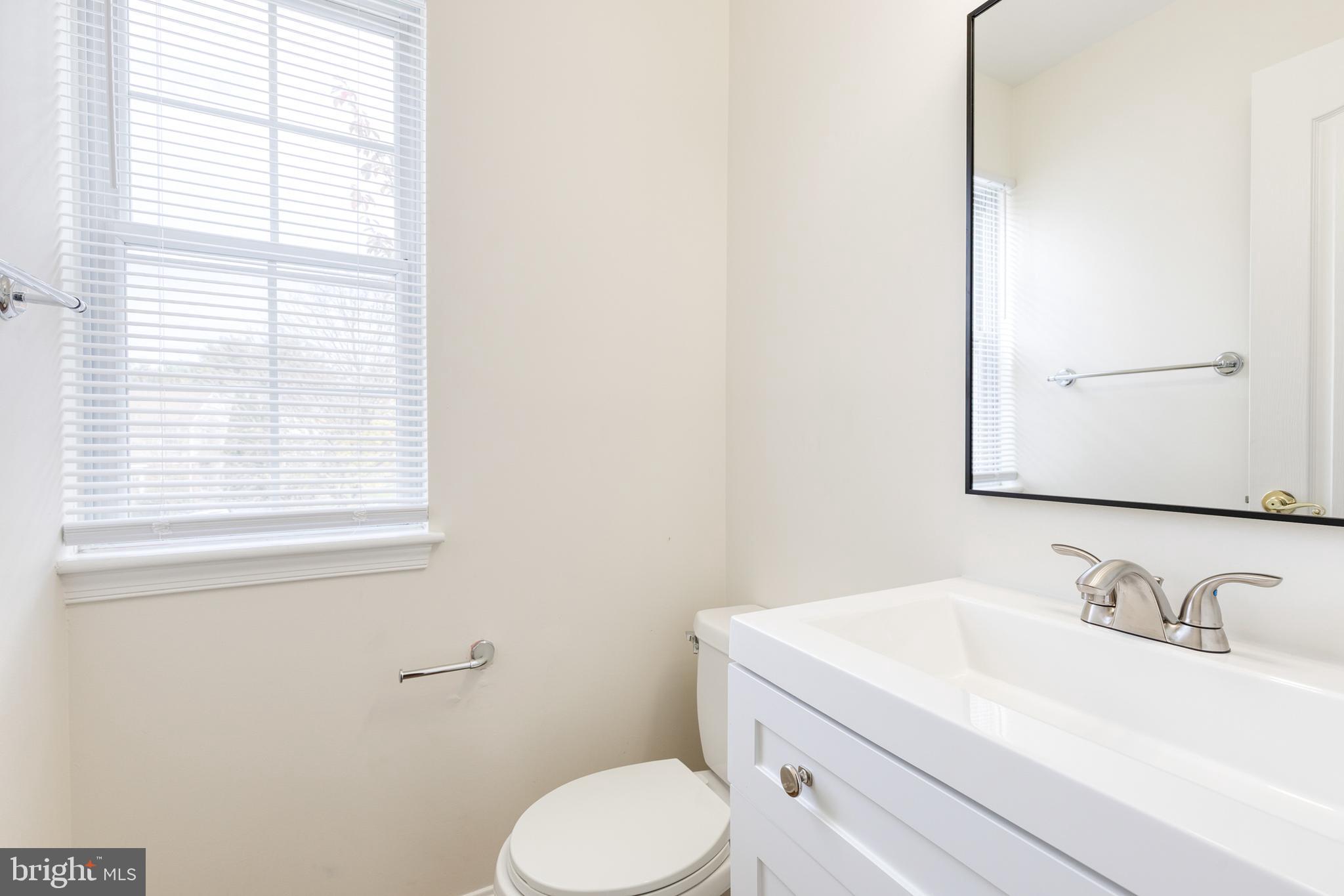 611 Brickston Road Reisterstown, MD 21136 - Photo 10 of 16 a bathroom with a sink and a toilet