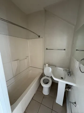 a bathroom with a sink and a bathtub