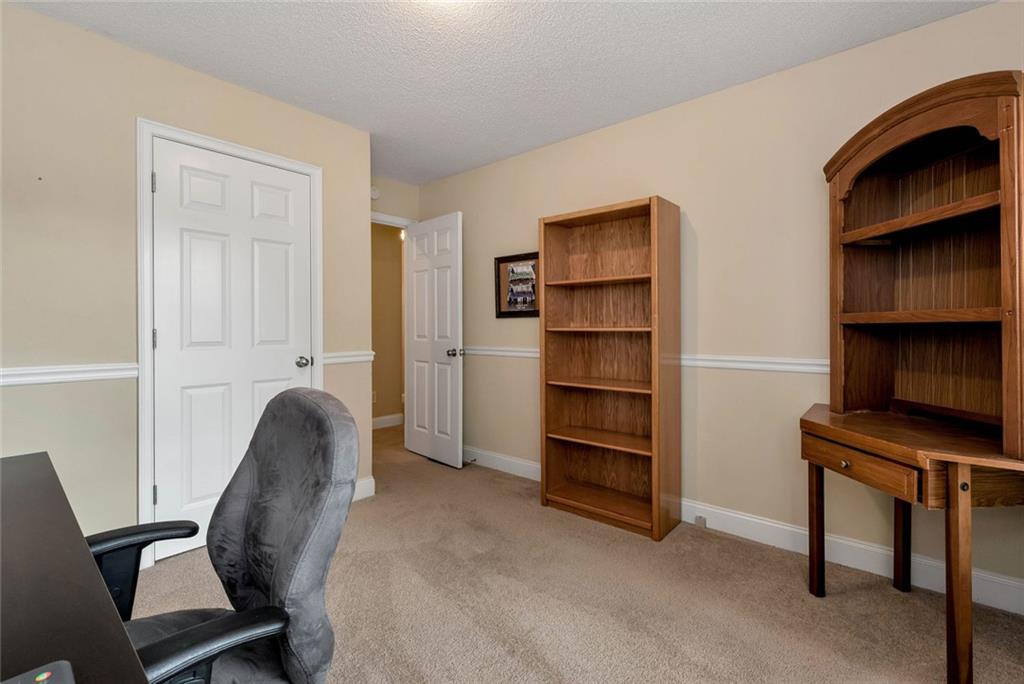 1044 Lothridge Road Cleveland, GA 30528 - Photo 29 of 40 a view of a workspace with furniture