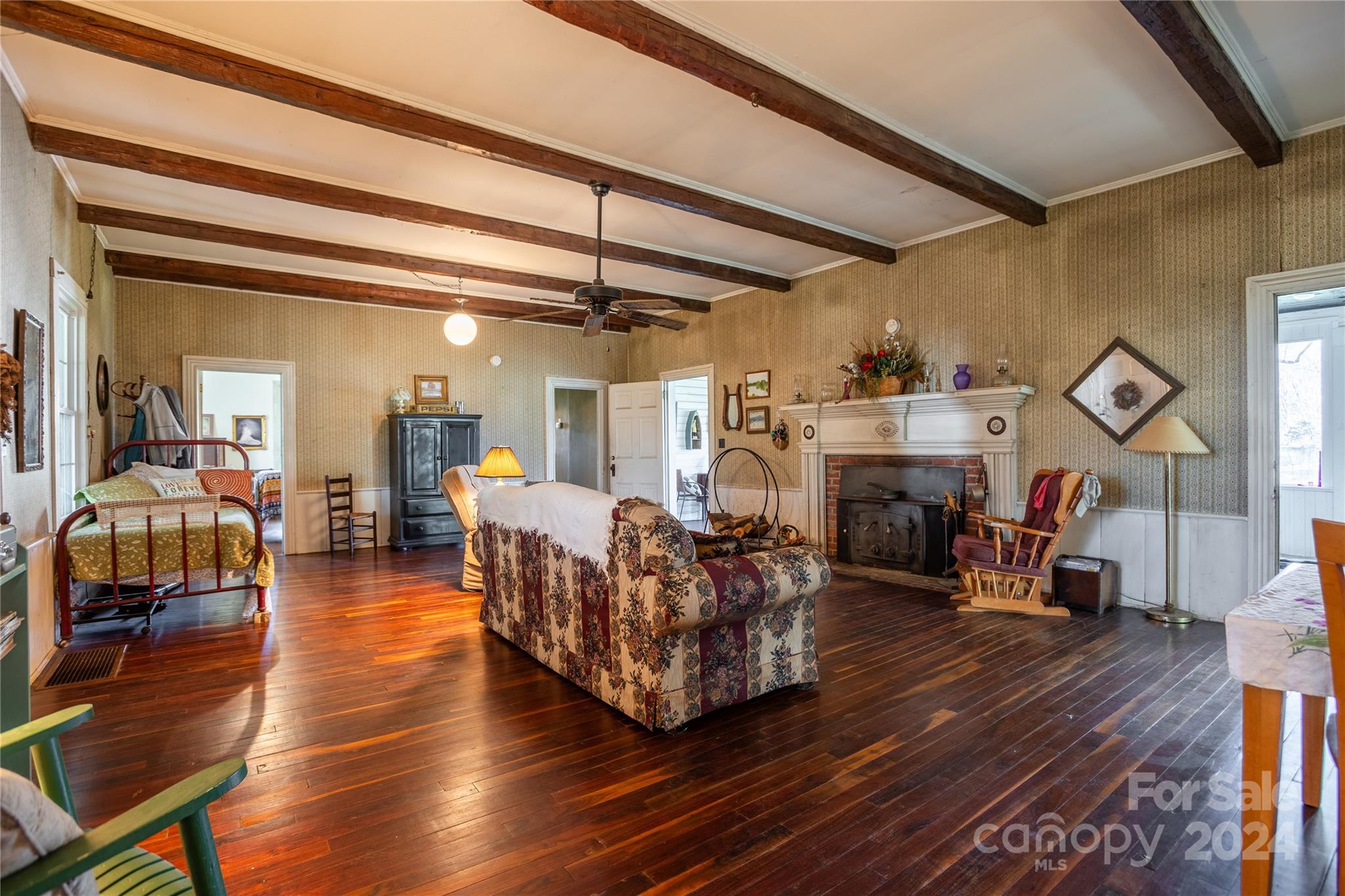 1347 Crossland Road Clover, SC 29710 - Photo 40 of 44 a living room with furniture a fireplace and a table