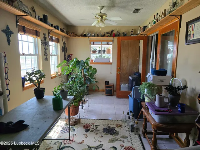 a room with furniture and flat screen tv