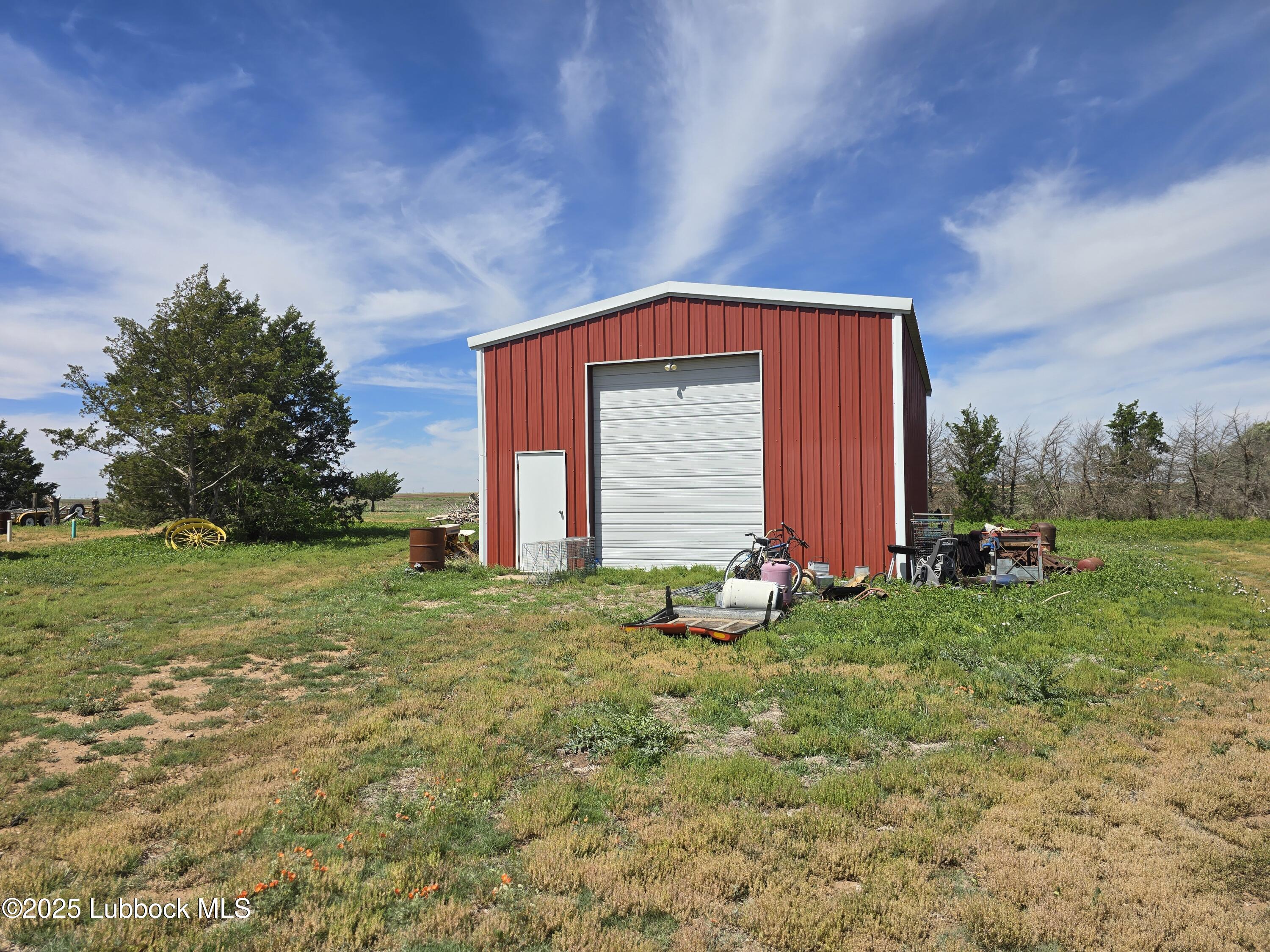 390 County Road Kress, TX 79052 - Photo 34 of 58 a front view of house with yard