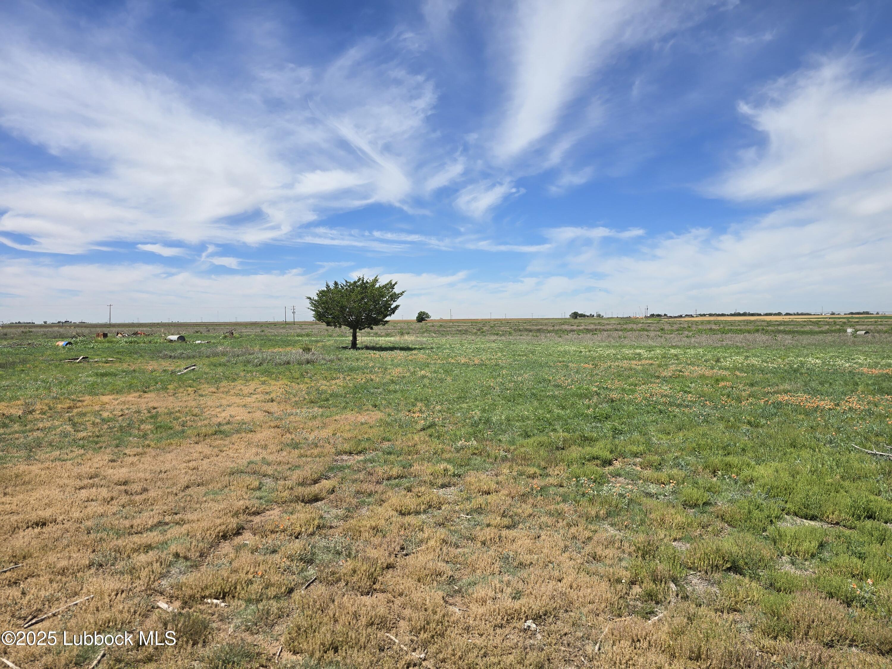 390 County Road Kress, TX 79052 - Photo 36 of 58 a view of an ocean from a yard
