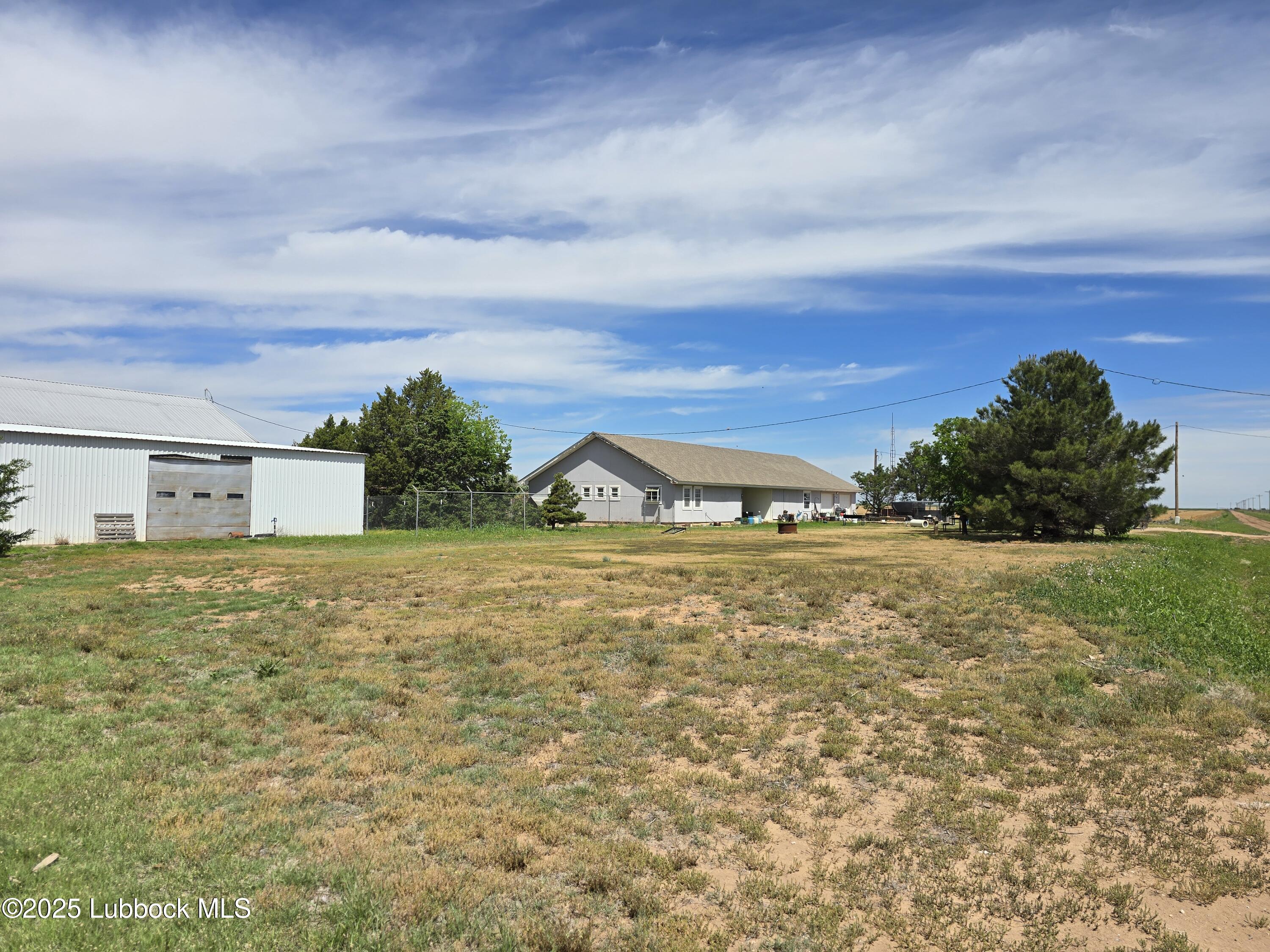 390 County Road Kress, TX 79052 - Photo 43 of 58 view of a house with a yard