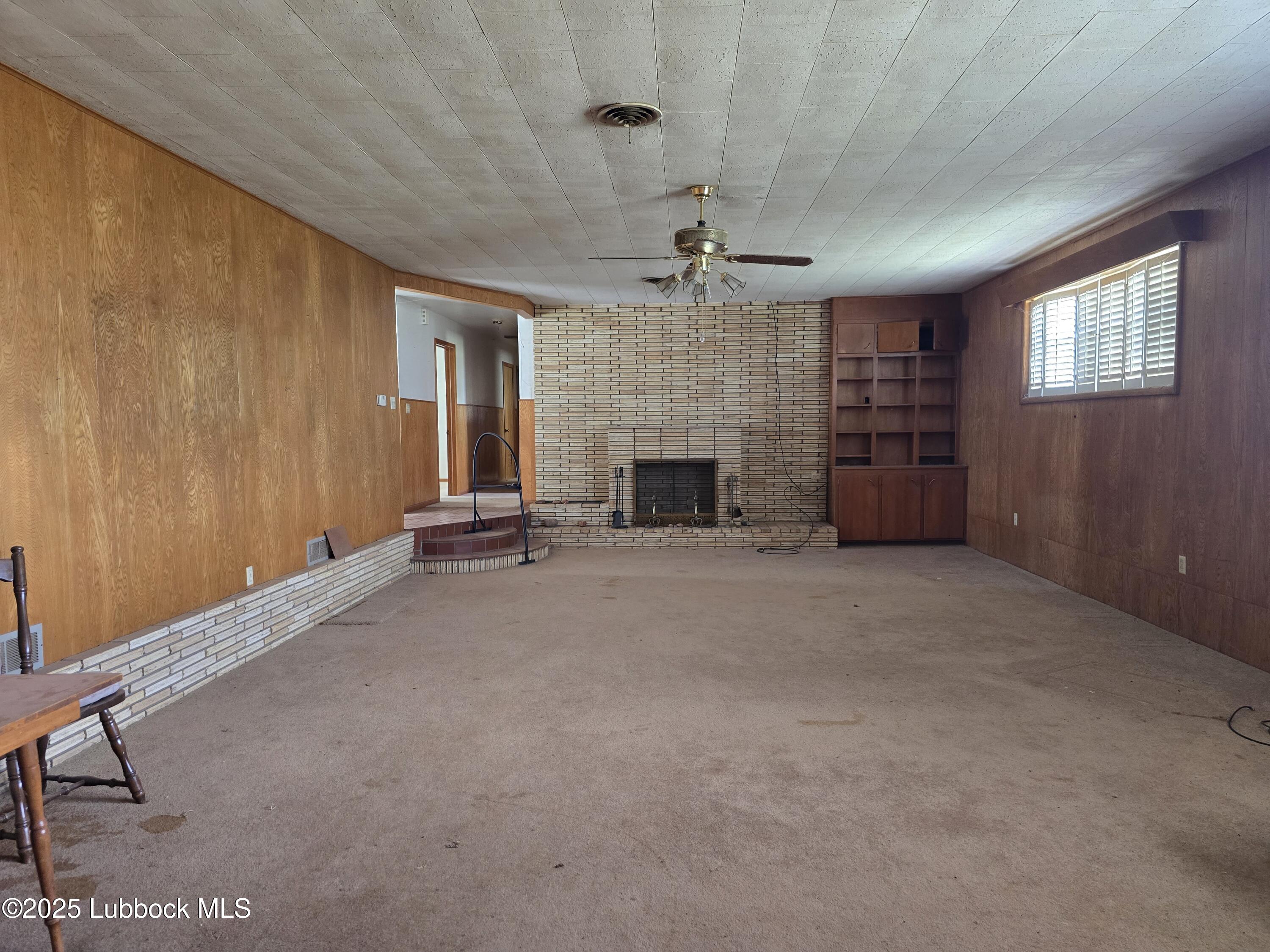 390 County Road Kress, TX 79052 - Photo 48 of 58 a view of a livingroom with a fireplace