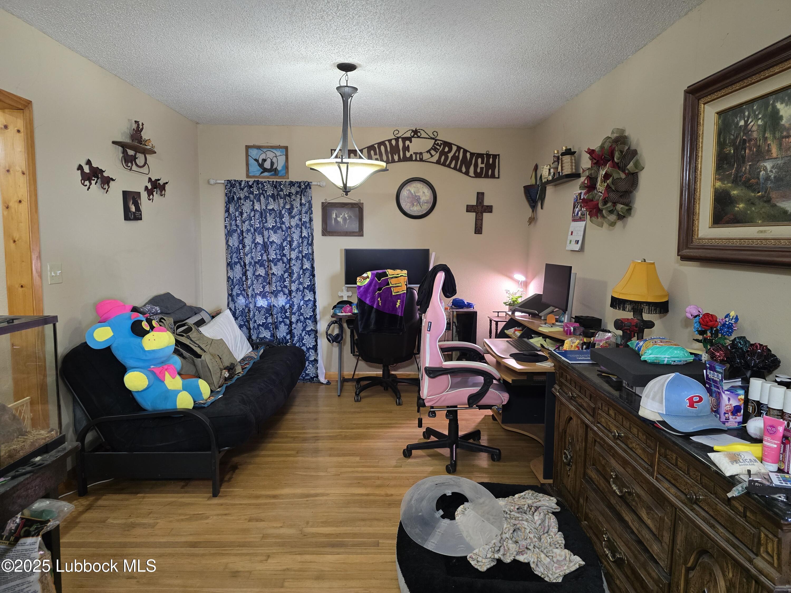 390 County Road Kress, TX 79052 - Photo 5 of 58 a play room with toys