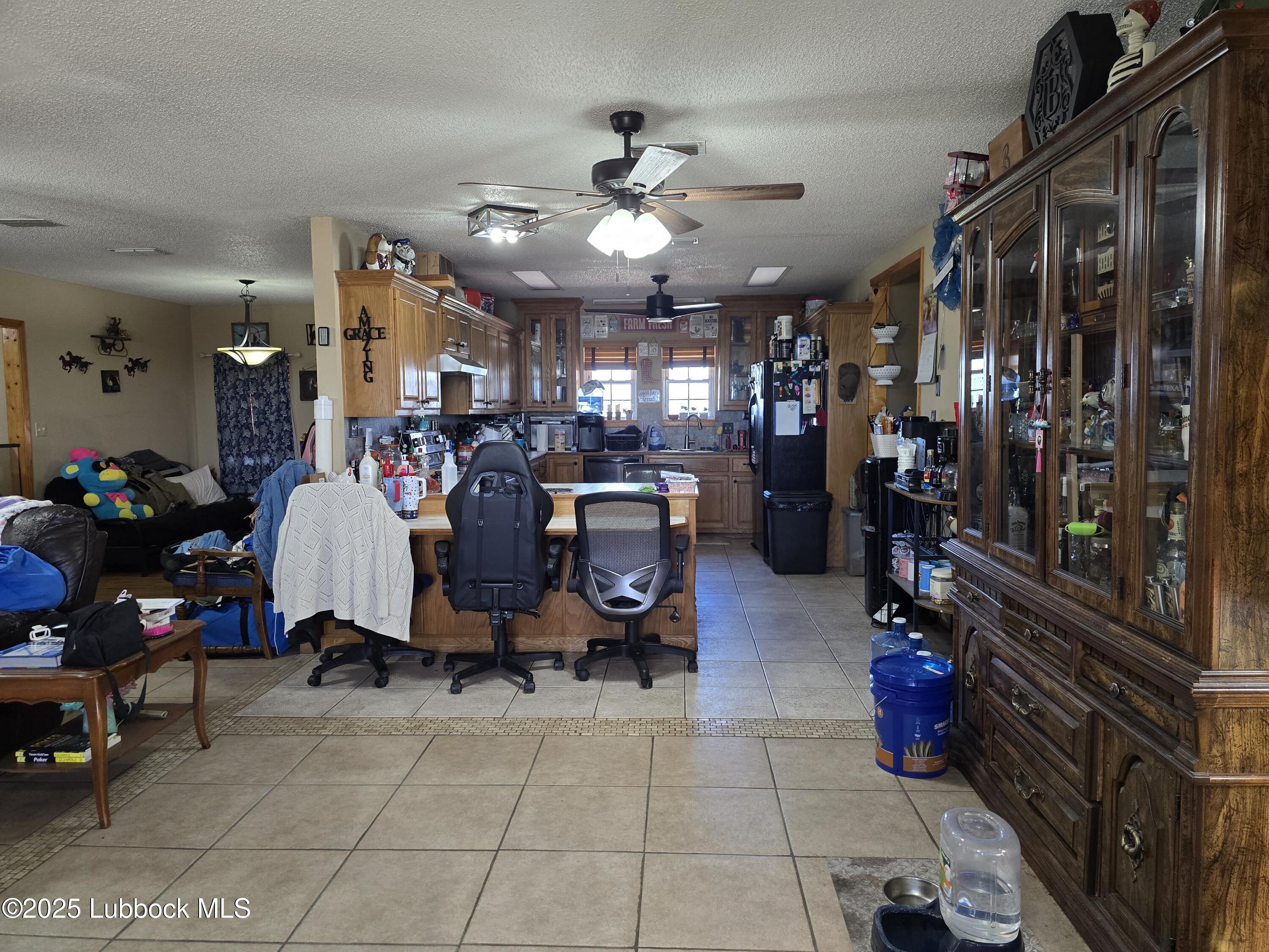 390 County Road Kress, TX 79052 - Photo 9 of 58 a view of a room with gym equipment