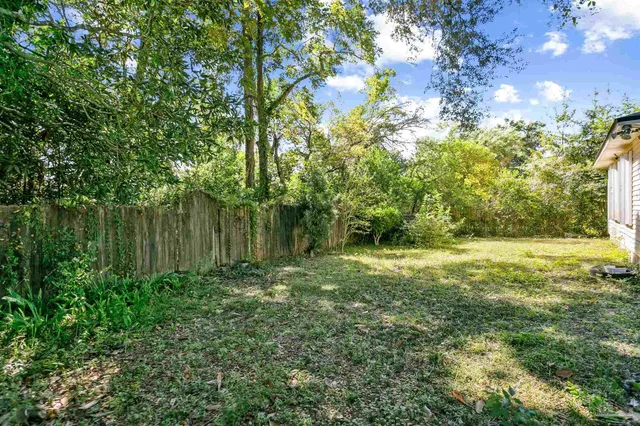 a view of outdoor space and yard