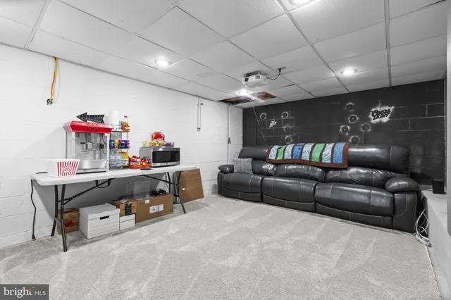 a living room with furniture and a couch