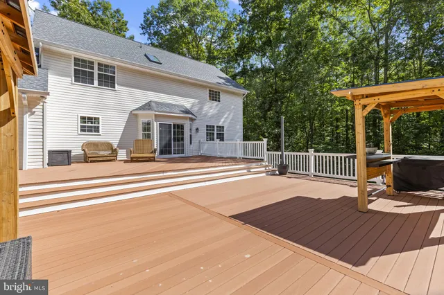 a view of a house with a roof deck