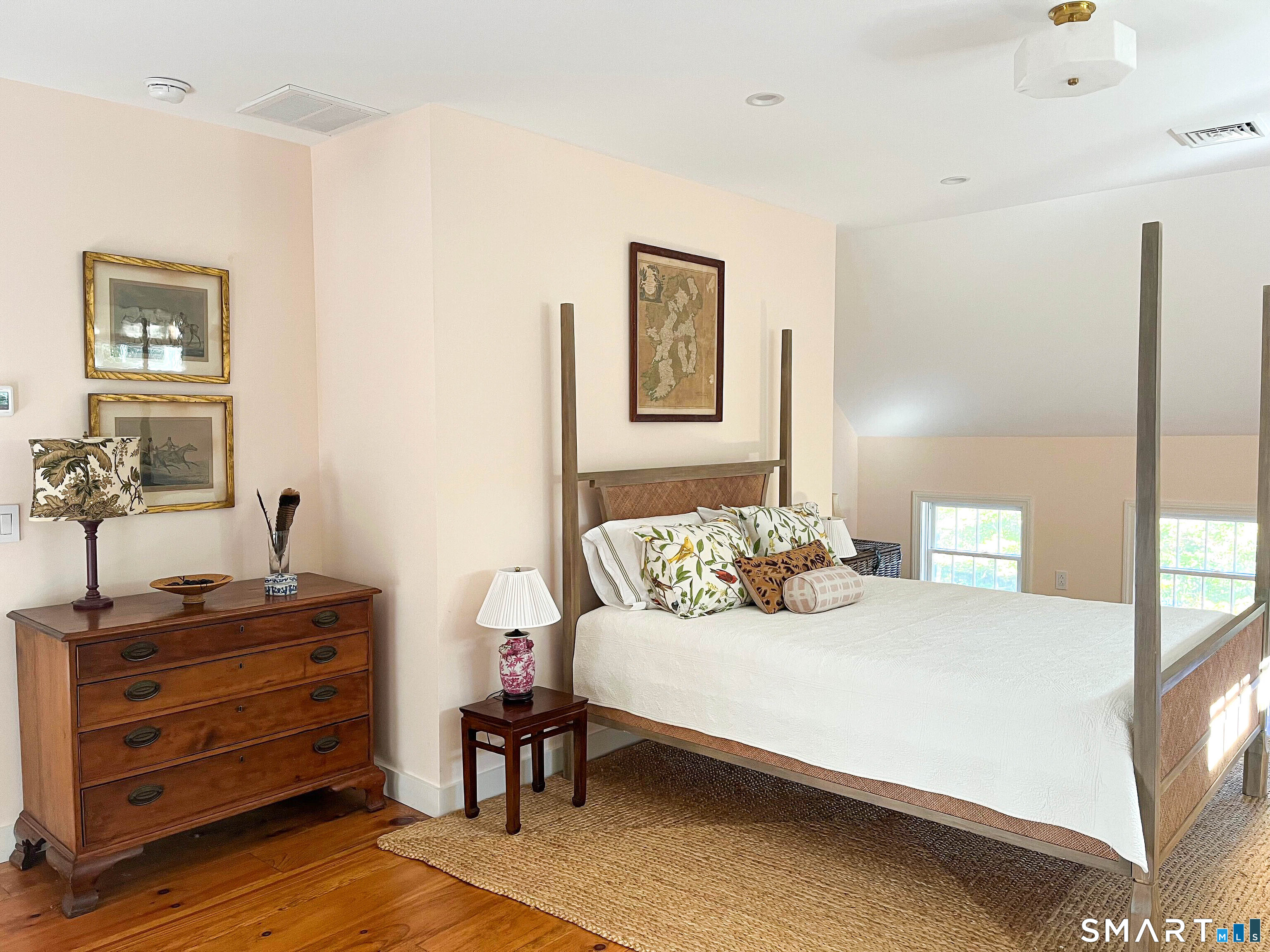 85 Gellert Road Hillsdale, NY 12529 - Photo 13 of 22 a bedroom with a bed and paintings on the wall