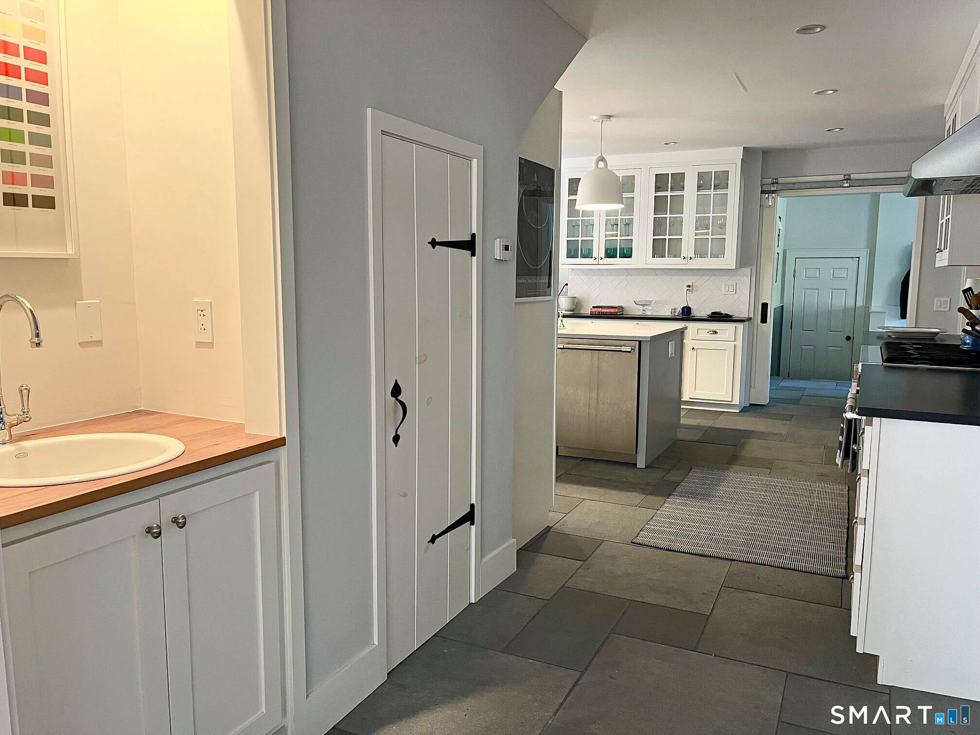 85 Gellert Road Hillsdale, NY 12529 - Photo 6 of 22 a kitchen with a refrigerator and a sink
